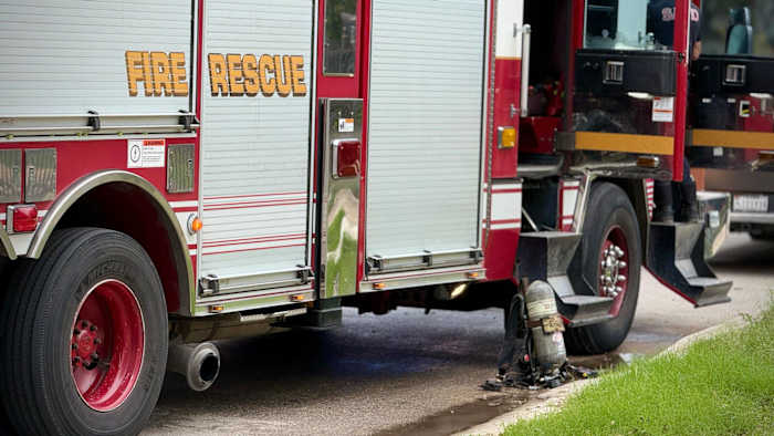 Firefighter injured after garbage truck tire blows out during post-fire assessment in Montgomery County