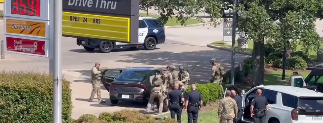 CONROE MC-SHELL SWAT SCENE ENDS WITH SUSPECT IN CUSTODY